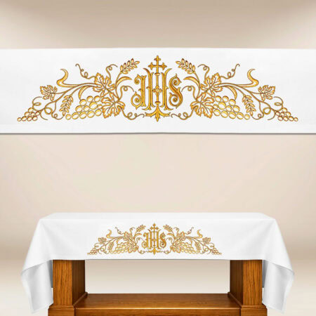 Mantel con bordado IHS dorado